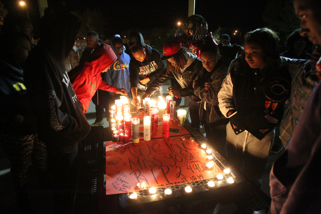 Friends of Roland Pleasant, the 18-year-old man shot and killed Tuesday night in North Las Vegas, attend a vigil for him at a park at East Azure Avenue and Terrasol Street near North Pecos Road in ...