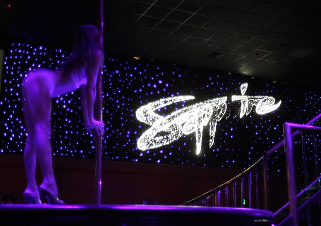 A dancer performs at Sapphire Gentlemen's Club in Las Vegas, June 23, 2004. (John Gurzinski/Las Vegas Review-Journal)