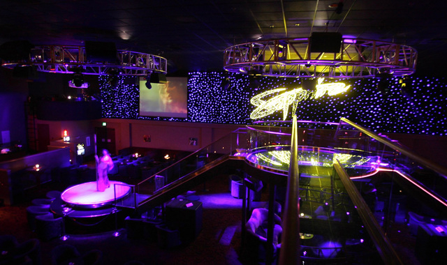 A dancer performs at Sapphire Gentlemen's Club in Las Vegas, June 23, 2004. (John Gurzinski/Las Vegas Review-Journal)