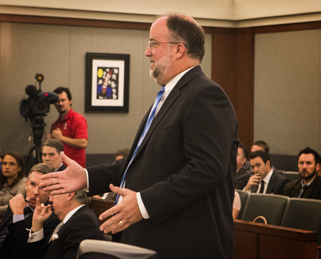 Senior Deputy Attorney General David Newton speaks during a hearing on Uber at the Regional Justice Center on Wednesday, Oct. 29, 2014. Judge Douglas Herndon denied a temporary restraining order a ...
