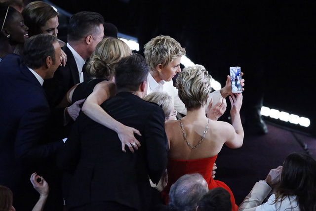 Host Ellen Degeneres takes a group picture at the 86th Academy Awards in Hollywood, California in this March 2, 2014 file photo. (REUTERS/Lucy Nicholson/Files)