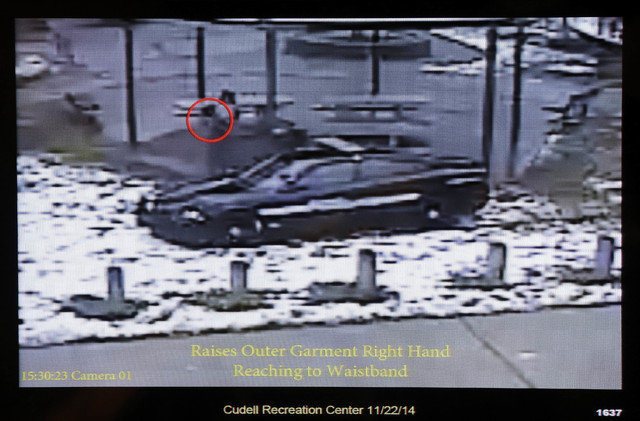 This still image taken from a surveillance video played at a news conference held by Cleveland police, Wednesday, Nov. 26, 2014, shows Cleveland police officers arriving at Cudell Park on a report ...
