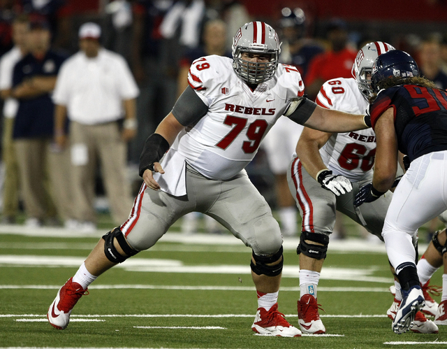 UNLV offensive linesman Robert Waterman (79) against Arizona during the first half of an NCAA college football game, Friday, Aug. 29, 2014, in Tucson, Ariz. (AP Photo/Rick Scuteri)
