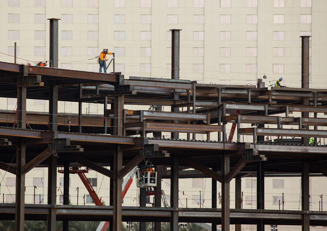 Construction continues at the MGM-AEG arena site, located on 16 acres west of the New York-New York parking garage, Thursday, Dec. 18, 2014. The 650,000-square-foot arena and event center is a $37 ...