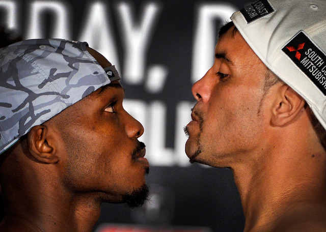 Timothy Bradley, left, and Diego Chavez face off with each other during the final weigh-in at the Cosmopolitian Las Vegas on Friday, Dec. 12, 2014, in Las Vegas. The two will fight in a 12-round w ...
