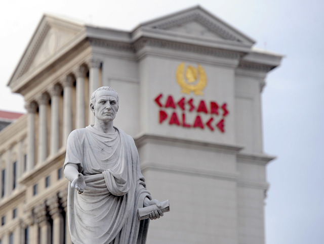 A statue on display is seen in front of Caesars Palace hotel-casino on Thursday, Dec. 11, 2014, in Las Vegas.  (David Becker/Las Vegas Review-Journal)