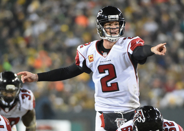 Atlanta Falcons quarterback Matt Ryan (2) calls a play in the third quarter during the game against the Green Bay Packers at Lambeau Field  on Dec. 8, 2014. (Benny Sieu-USA TODAY Sports)