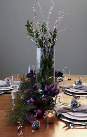 Tribune News Service
Centerpieces don't have to cost a bundle. Items you might already have in the home can be repurposed to help create an elegant table.