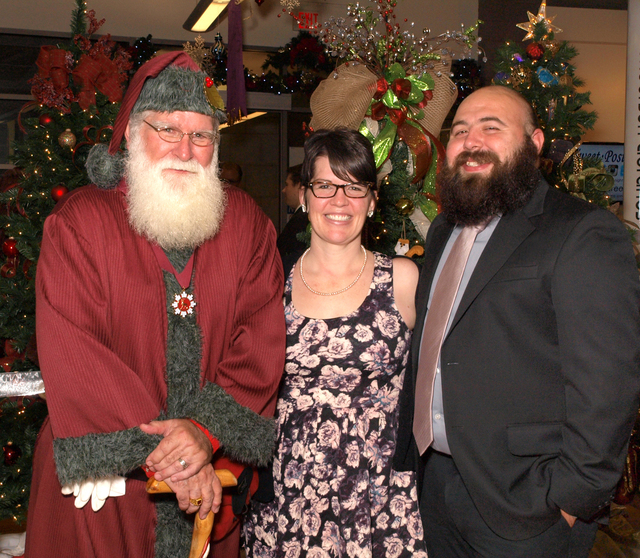 Santa, and Megan and Adam Neri (Marian Umhoefer/Las Vegas Review-Journal)