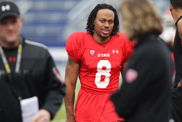 Utah wide receiver Kaelin Clay (8) walks off the field after a team practice at Bishop Gorman Catholic High School in Las Vegas Wednesday, Dec. 17, 2014. Utah will play against Colorado State in t ...