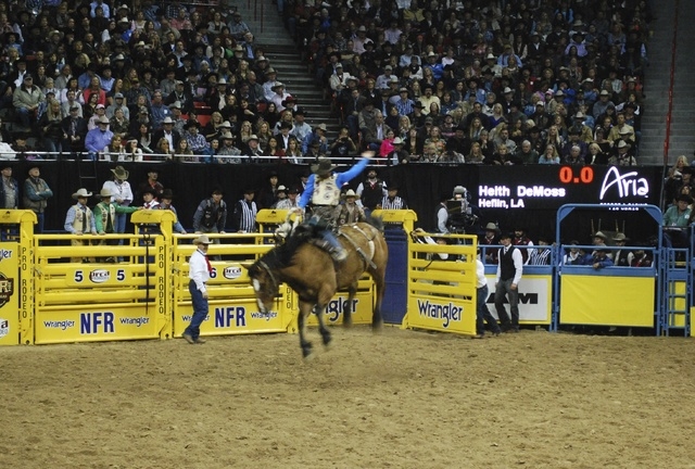 Saddle bronc rider Heith DeMoss is in the mix for a gold buckle, but he has a slim lead and might need some help in the final round. (NEAL REID/SPECIAL TO THE REVIEW-JOURNAL)
