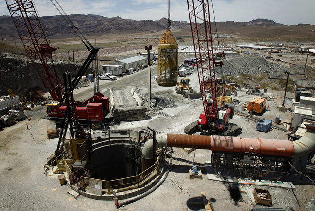 A worker is raised from a tunnel system at Lake Mead near Las Vegas Wednesday, June. 12, 2013. The Southern Nevada Water Authority will use the tunnel to link a third intake, still under construct ...