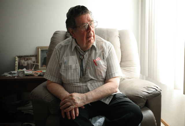 Korean War veteran Charles "Chuck" P. Mahoney sits in his Las Vegas home, Tuesday, April 10, 2012. Mahoney, who was wounded during the war was denied disability when he applied for benefits back t ...