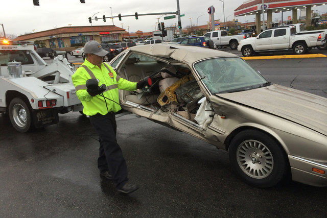 One person was injured in a two-vehicle crash Friday afternoon, Dec. 12, 2014, near Rainbow and Charleston boulevards. (Bizuayehu Tesfaye/Las Vegas Review-Journal)
