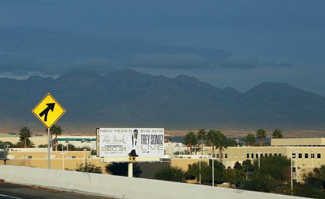 Clouds move into the Las Vegas Valley on Friday, Dec. 12, 2014. A weather system that is bringing heavy rainfall to California and southern parts of Oregon is going to drop some moisture on the La ...