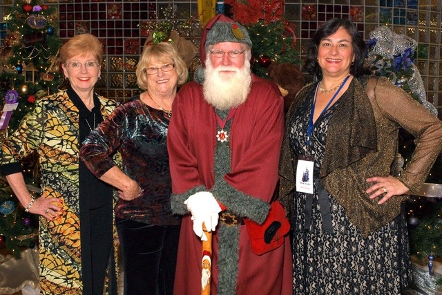 Diane Collins, from left, Andrea Frazier, Santa and Julia Buckley (Marian Umhoefer/Las Vegas Review-Journal)