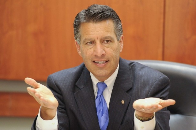 Gov. Brian Sandoval is shown here as he speaks to the Las Vegas Review-Journal editorial board on Thursday, Oct. 9, 2014. Sandoval said Friday he is not getting involved in the ongoing Assembly le ...
