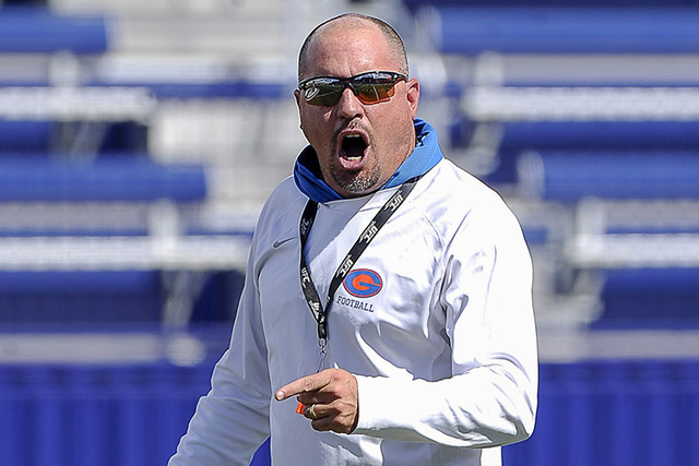 Coach Tony Sanchez gives instruction during football practice at Bishop Gorman High School in Las Vegas Wednesday, August 20, 2014. (Josh Holmberg/Las Vegas Review Journal)