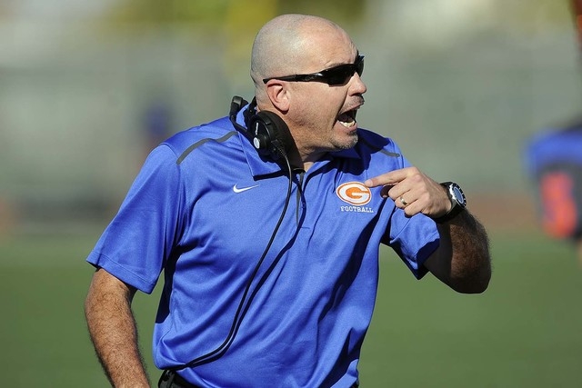 Bishop Gorman head coach Tony Sanchez shouts instructions during their Division I state football semifinal game against Liberty at Rancho High School in Las Vegas Saturday, Nov. 29, 2014. Sanchez  ...