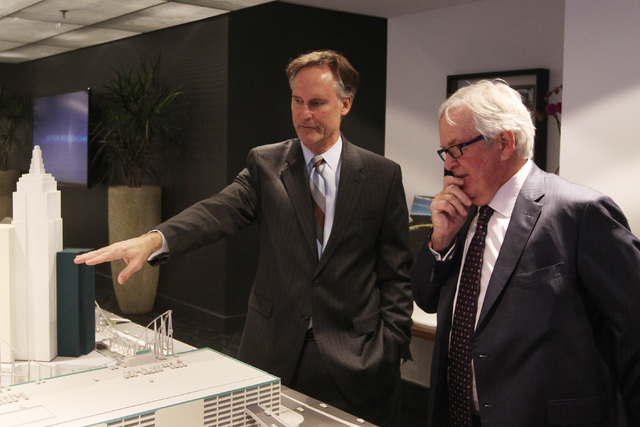 AEG Senior Vice President Mark Faber, left, shows off a model of the new Las Vegas Arena, not pictured, to businessman Bill Foley Thursday, Jan. 15, 2015 at New York New York. Foley is attempting  ...
