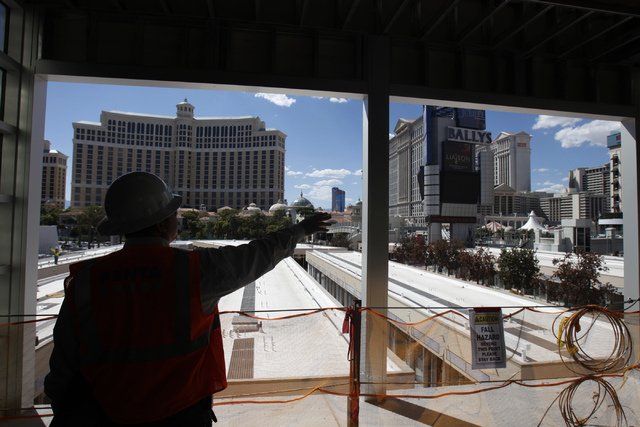 Michael Diebel, project manager with the Penta Building Group, gives a tour of the construction site of the future Grand Bazaar Shops at Bally's casino-hotel in Las Vegas Thursday, Sept. 4, 2014.  ...
