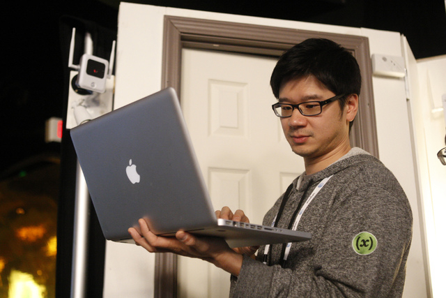 Jan Shim, member of team xMatters, works on his computer during the 2015 AT&T Hackathon competition at the Palms casino-hotel in Las Vegas Sunday, Jan. 4, 2015. (Erik Verduzco/Las Vegas Review-Jou ...