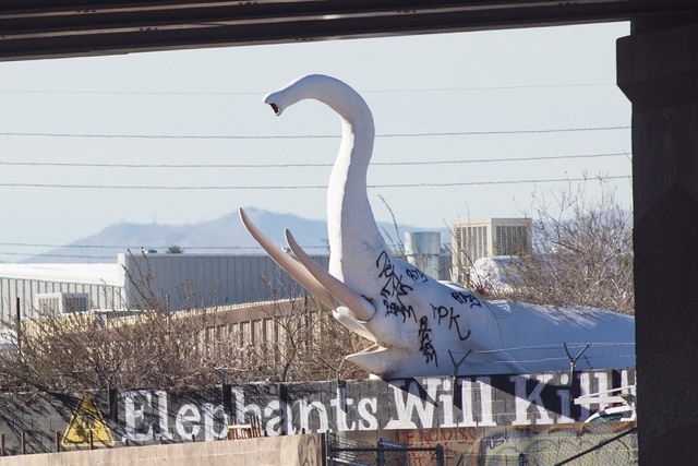 The statue of a charging elephant, which has been around for 30 or so years, is seen on the west side of Interstate 15 between the Cheyenne Avenue and Lake Mead Boulevard exits in Las Vegas on Wed ...