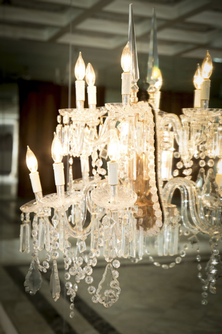 The old Liberace home features mirrored walls chandelier wall sconces. (Tonya Harvey/Real Estate Millions)