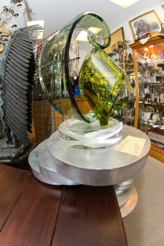A glass sculpture is priced at $1,500 at Not Just Antiques. (Donavon Lockett/View)
