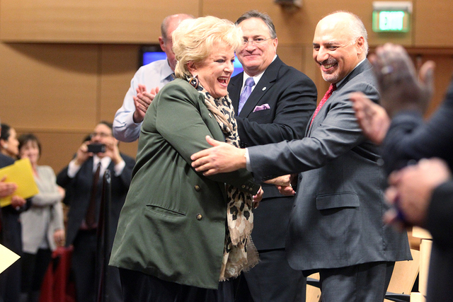 Las Vegas Mayor Carolyn Goodman, left, greets Mayor Pro Tem Stavros Anthony, right, and other members of the City Council before delivering her State of the City speech at City Hall Thursday, Jan. ...