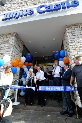 Clark County Commissioner Chris Giunchigliani, left and Lisa Ingram, president of White Castle, cut a ceremonial ribbon prior to the opening of the hamburger chain's newest on the Strip on Tuesday ...