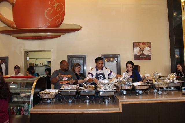 Truth Christian Ministries International members prepare to serve food during a community event at 5101 N. Rainbow Blvd., Nov. 2014. (Special to View)