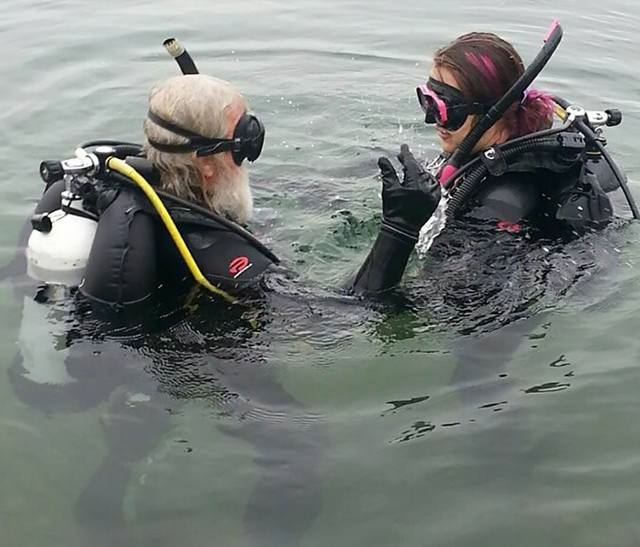 Scuba Views instructor Bill Duckro teaches Allison Capps how to dive at Lake Mead, Dec. 2014. (Special to View)