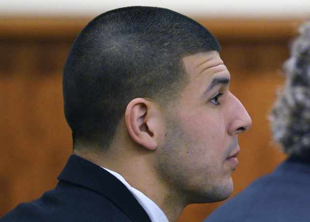 Former New England Patriots football player Aaron Hernandez attends a pre-trial hearing at Bristol County Superior Court in Fall River, Massachusetts, January 6, 2015. Hernandez is facing charges ...