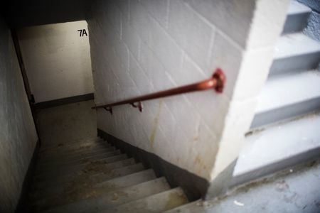A stairwell is seen at a building in a public housing project known as the "Pink Houses" where Akai Gurley was killedin Brooklyn, New York, Nov. 21, 2014. (Reuters/Lucas Jackson)
