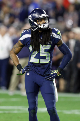 Feb 1, 2015; Glendale, AZ, USA; Seattle Seahawks cornerback Richard Sherman (25) reacts during the fourth quarter against the New England Patriots in Super Bowl XLIX at University of Phoenix Stadi ...