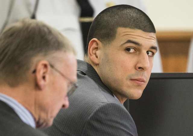 Former New England Patriots player Aaron Hernandez attends his murder trial at Bristol County Superior Court in Fall River, Massachusetts February 3, 2015. (REUTERS/Aram Boghosian/The Boston Globe ...