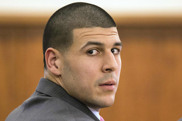 Former New England Patriots player Aaron Hernandez glanced towards the media during his murder trial at Bristol County Superior Court in Fall River, Massachusetts February 3, 2015. (REUTERS/Aram B ...