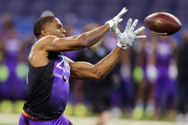 Feb 23, 2015; Indianapolis, IN, USA; Connecticut Huskies defensive back Byron Jones catches a pass in a work out drill during the 2015 NFL Combine at Lucas Oil Stadium. (Brian Spurlock-USA TODAY S ...
