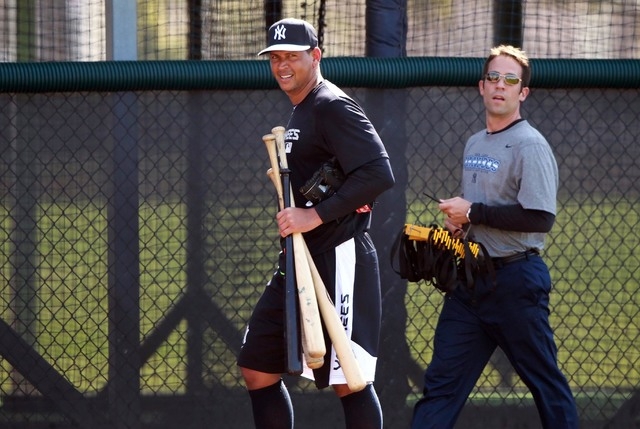 Feb 23, 2015; Tampa, FL, USA; New York Yankees third baseman Alex Rodriguez (13) walks back into the complex after he working out for spring training at Yankees Minor League Complex. (Kim Klement- ...