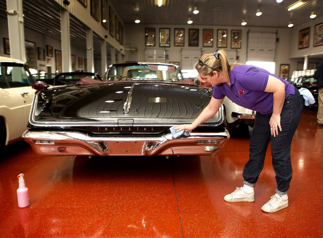 Karen Bovino details a 1958 Chrysler Imperial at the Rogers' Classic Car Museum, 1480 Gragson Avenue, on Tuesday, Feb. 3, 2015. (Jeff Scheid/Las Vegas Review-Journal)