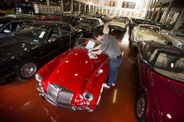 Joe Boyle with Mecum Auctions tags a 1956 MG A Roadster at the Rogers' Classic Car Museum, 1480 Gragson Avenue, on Tuesday, Feb. 3, 2015. (Jeff Scheid/Las Vegas Review-Journal)