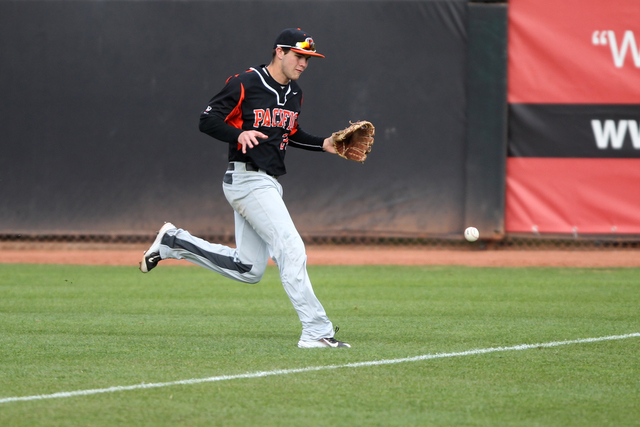 Pacific Nathan Verlin (20) chases a ball in the outfield against UNLV in their baseball game at Wilson Stadium in Las Vegas Monday, Feb. 23, 2015. UNLV won 11-1. (Erik Verduzco/Las Vegas Review-Jo ...
