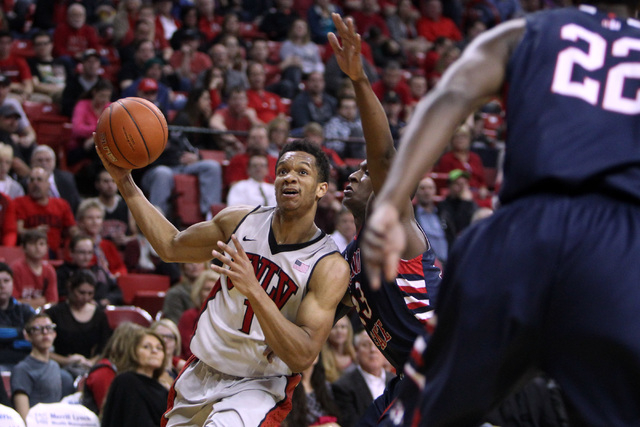 UNLV guard Rashad Vaughn drives past Fresno State guard Marvelle Harris during the first half of their Mountain West Conference game Tuesday, Feb. 10, 2015, at the Thomas & Mack Center. (Sam Morri ...