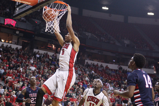UNLV forward Christian Wood dunks on Fresno State during the first half of their Mountain West Conference game Tuesday, Feb. 10, 2015, at the Thomas & Mack Center. (Sam Morris/Las Vegas Review-Jou ...