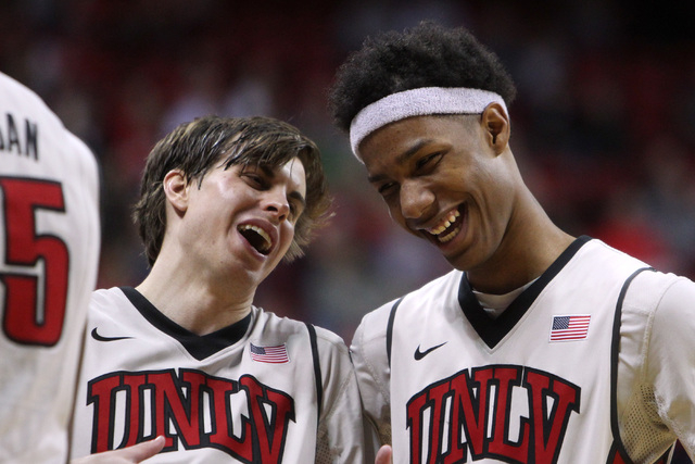 UNLV guard Cody Doolin and UNLV guard Patrick McCaw  joke during a timeout the second half of their Mountain West Conference game Tuesday, Feb. 10, 2015, at the Thomas & Mack Center. UNLV won 73-6 ...