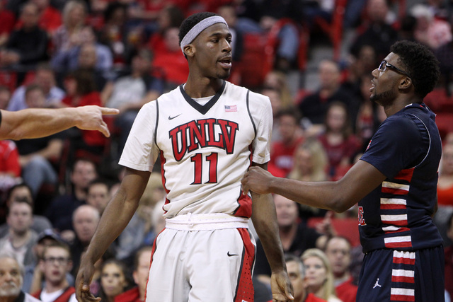 UNLV forward Goodluck Okonoboh and Fresno State forward Karachi Edo exchange words during the second half of their Mountain West Conference game Tuesday, Feb. 10, 2015, at the Thomas & Mack Center ...