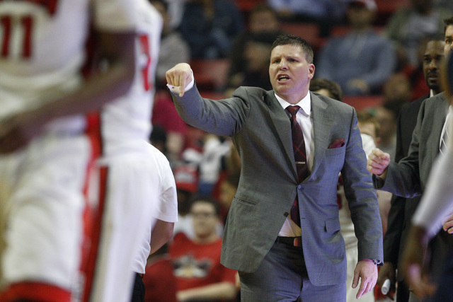 UNLV assistant coach Ryan Miller calls a play during the first half of their Mountain West Conference game against Fresno State Tuesday, Feb. 10, 2015, at the Thomas & Mack Center. (Sam Morris/Las ...