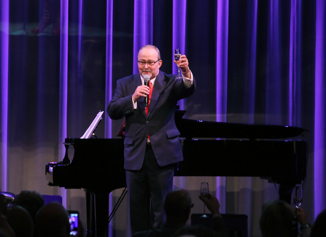 Myron Martin, The Smith Center president, leads a toast during a reveal of the The Smith Center's 2015-16 Broadway season lineup Feb. 23, 2015, in Las Vegas. Audience members enjoyed two musical n ...