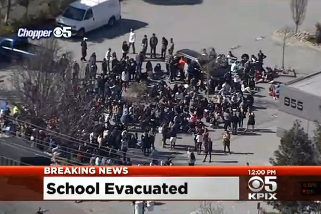 A high school in Redwood City, California, was evacuated on Monday following a 911 call, although police reported no confirmed gunman or shooting. (Screengrab KPIX)